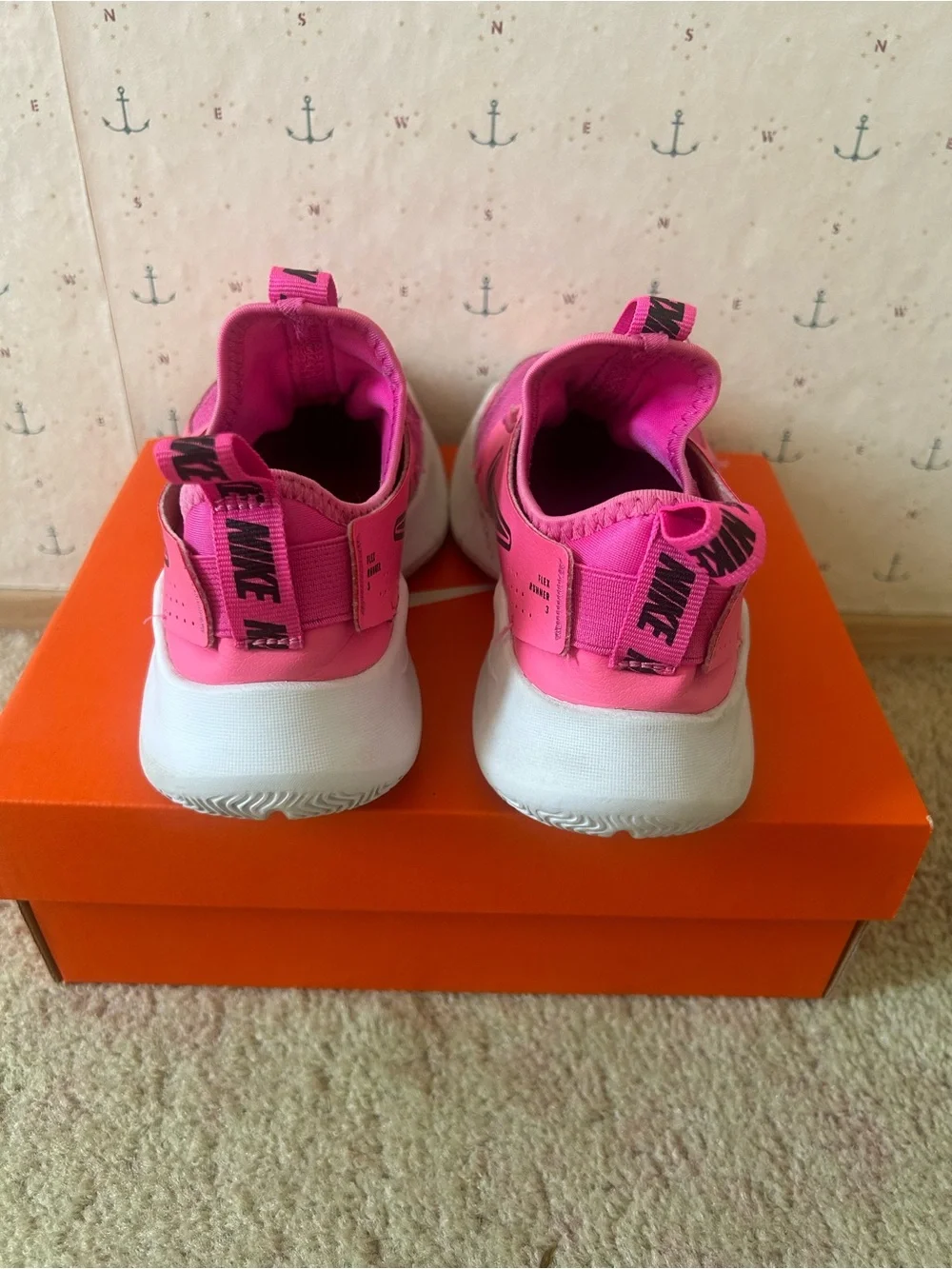 Nike Kids Pink Slip-On Sneakers with Hook Pull Tabs. Flex Runner